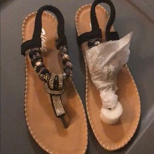 Black braided sandals